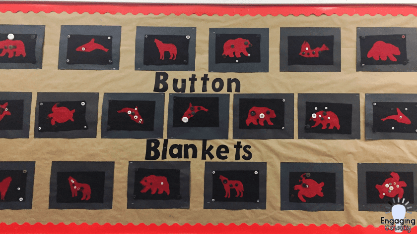 alt="a bulletin board covered in red and black 5' by 7"  button blankets as an example of student achievement when teachers learn how to increase student engagement"